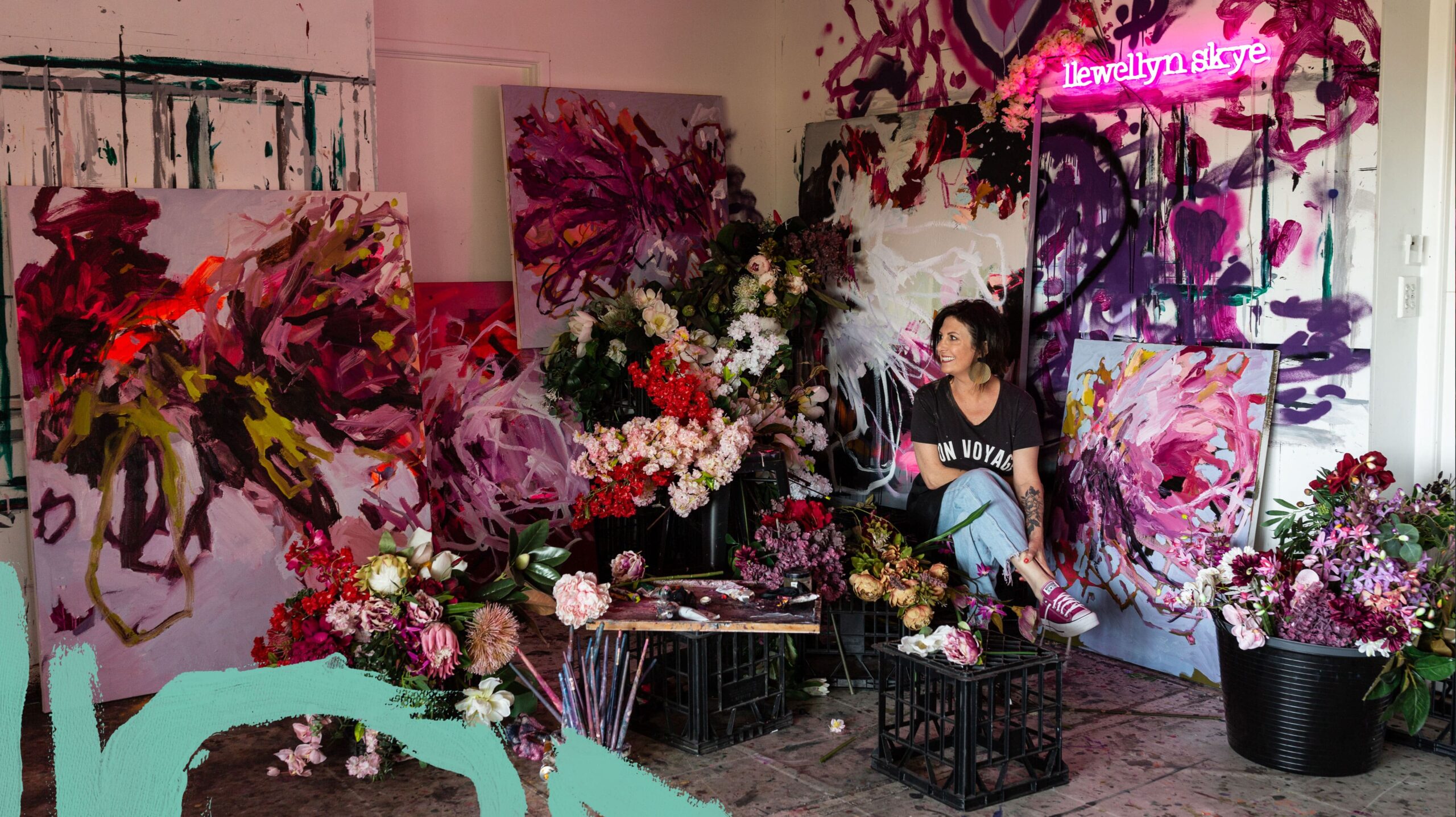 Artist Llewellyn Skye in her Gold Coast studio surrounded by her muse, florals
